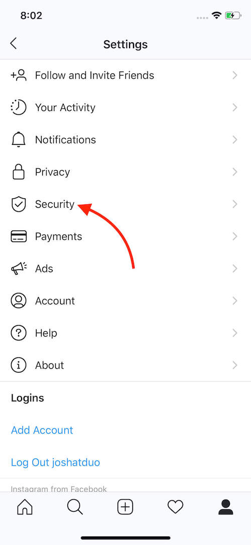 Instagram settings screen with red arrow pointing to the 'Security' menu option.