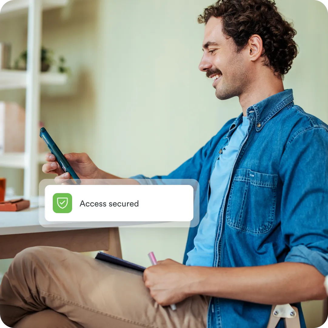 User receiving Duo MFA prompt on phone for identity verification.