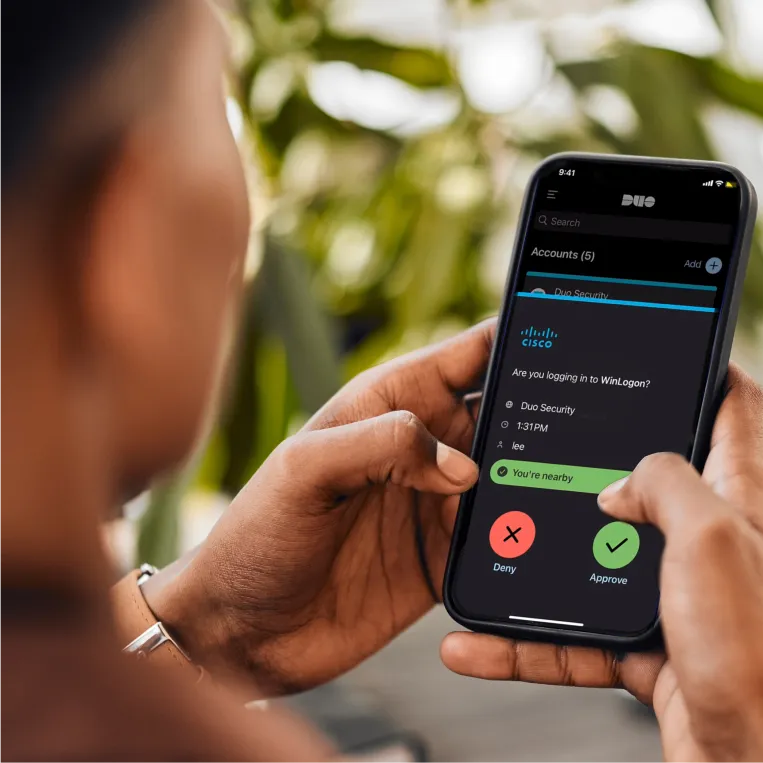 Smartphone screen showing a Duo Security login request with Approve and Deny options.