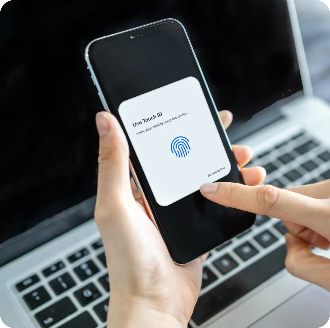 Touch ID notification from Duo for passwordless authentication to log in securely using Duo Mobile or FIDO2.
